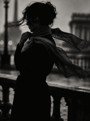 Windswept Silhouette black and white photography wall art print of a woman with wind-blown hair and scarf at a stone balustrade — digital download.